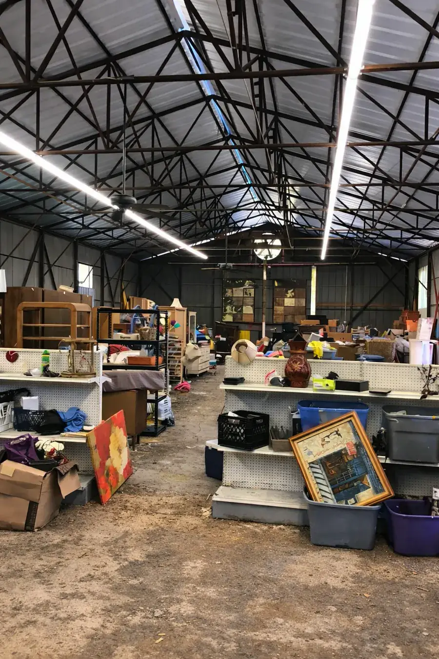 Ocala property cleanout before — a building packed floor to ceiling with furniture and junk