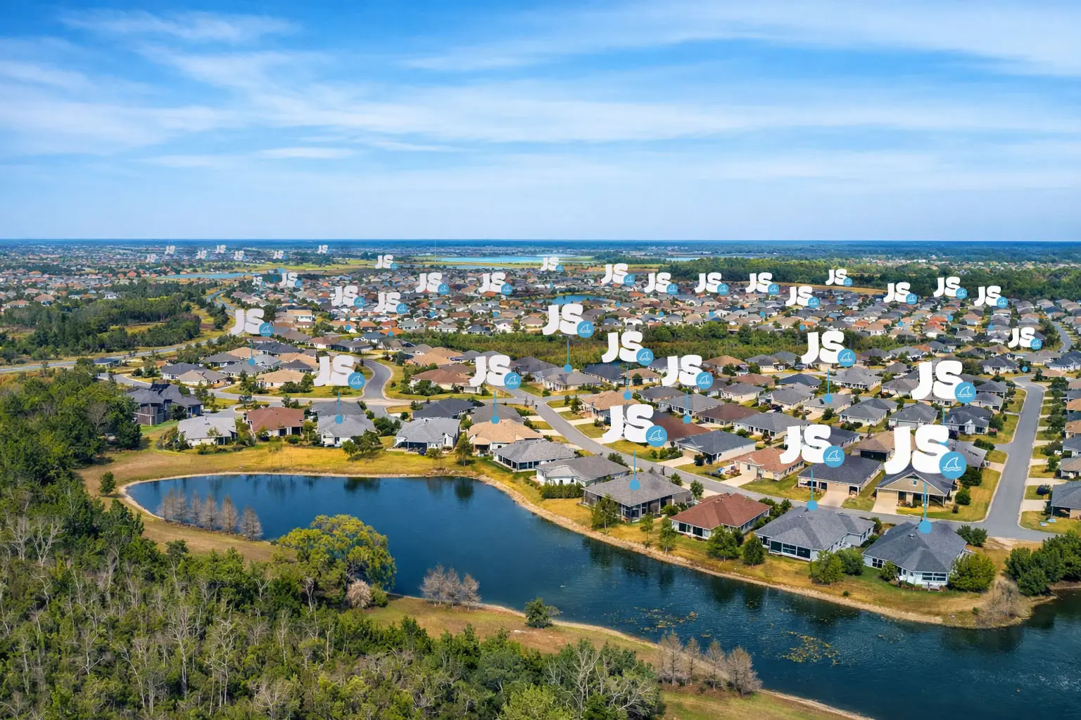 Aerial view of an Ocala neighborhood dotted with Junk Sharks service pins